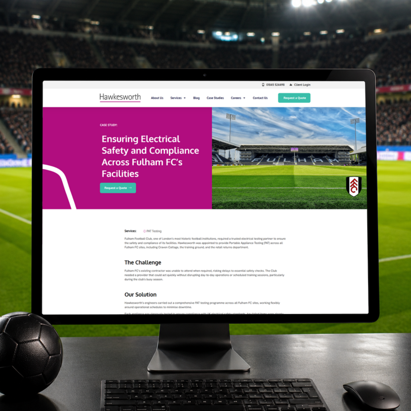 Computer displaying Hawkesworth’s electrical safety and compliance case study for Fulham FC against a football stadium background.